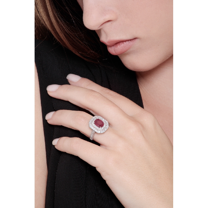 Diamond double halo ring with a central ruby