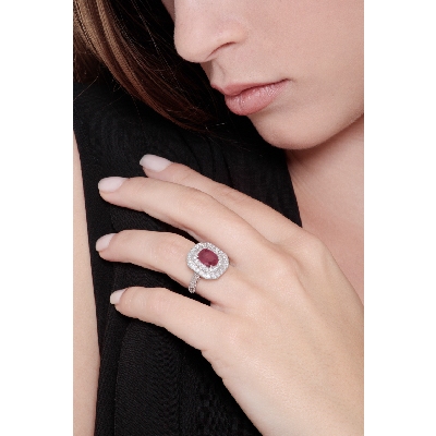 Diamond double halo ring with a central ruby