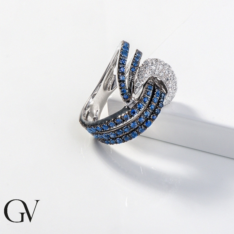 White gold 18k knot ring with blue sapphires and diamonds 