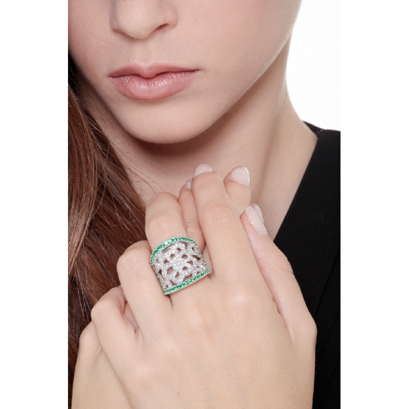 18k white gold perforated ring with diamonds and emeralds