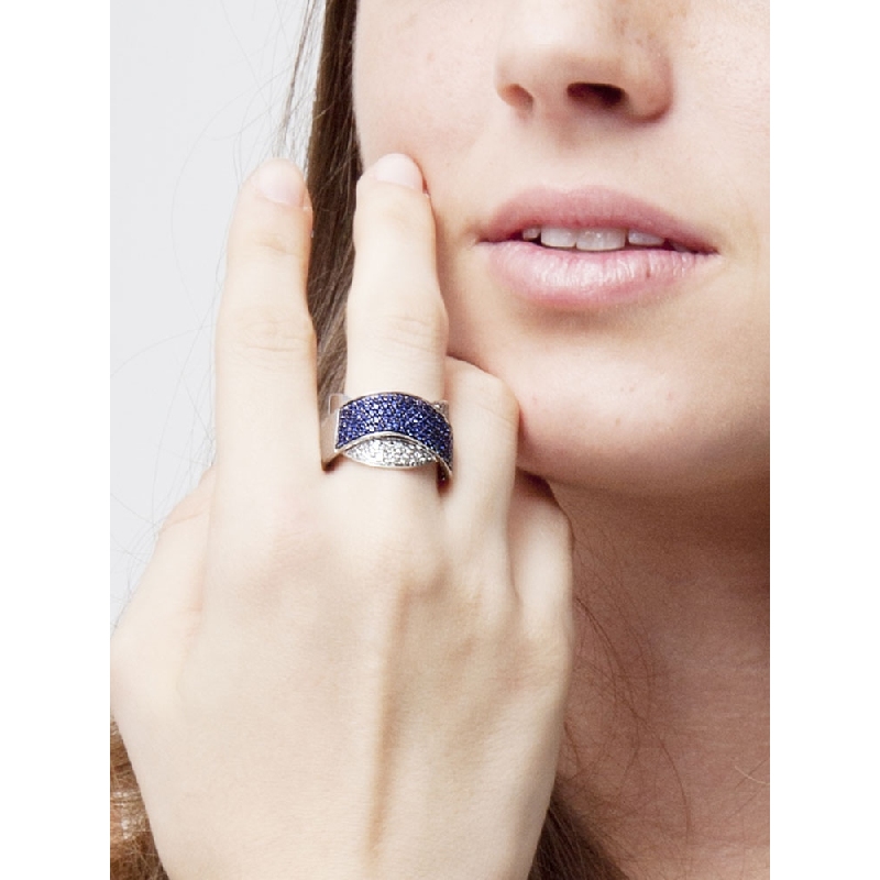 Criss cross ring with waves of blue sapphires and diamonds 