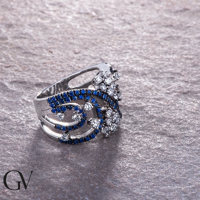 Band ring in white gold 18k with blue sapphires and diamonds 