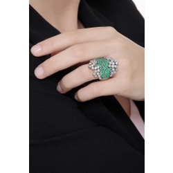 White gold 18k ring with diamonds and emeralds in the central band  2