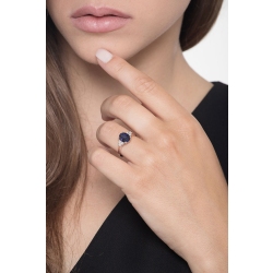 18k white gold with a central blue sapphire and six lateral diamonds  2