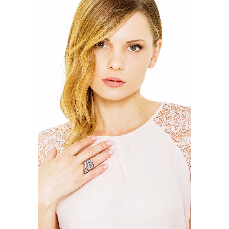 18k white gold ring with waves of blue sapphires and diamonds 