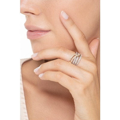 18k white and rosé gold crossover ring with diamonds 