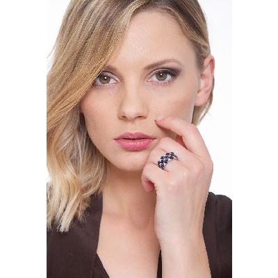 18k white gold ring with three rows of diamonds and blue sapphires 