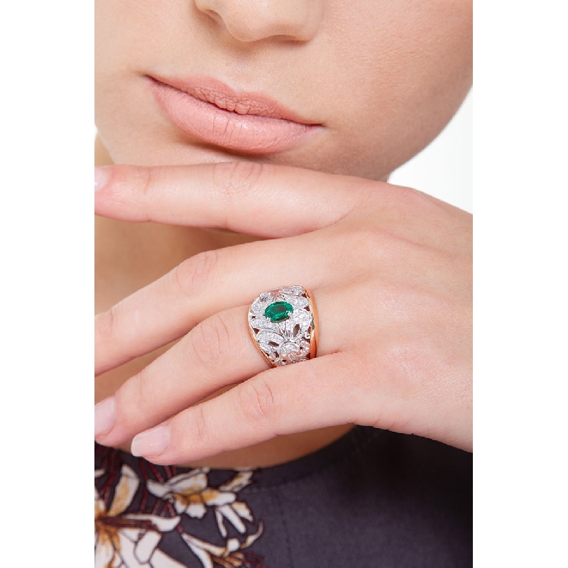 18k rosé and white gold with a central emerald and diamonds 