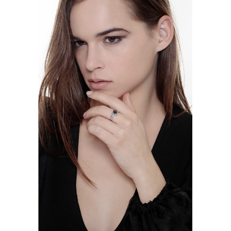 White gold 18k ring with a black diamond and white diamonds 