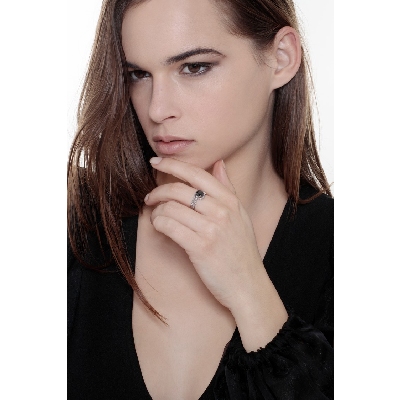 White gold 18k ring with a black diamond and white diamonds 