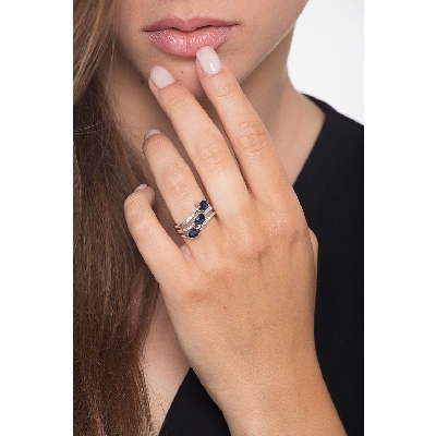 18k white gold ring with diamonds and three blue sapphires 