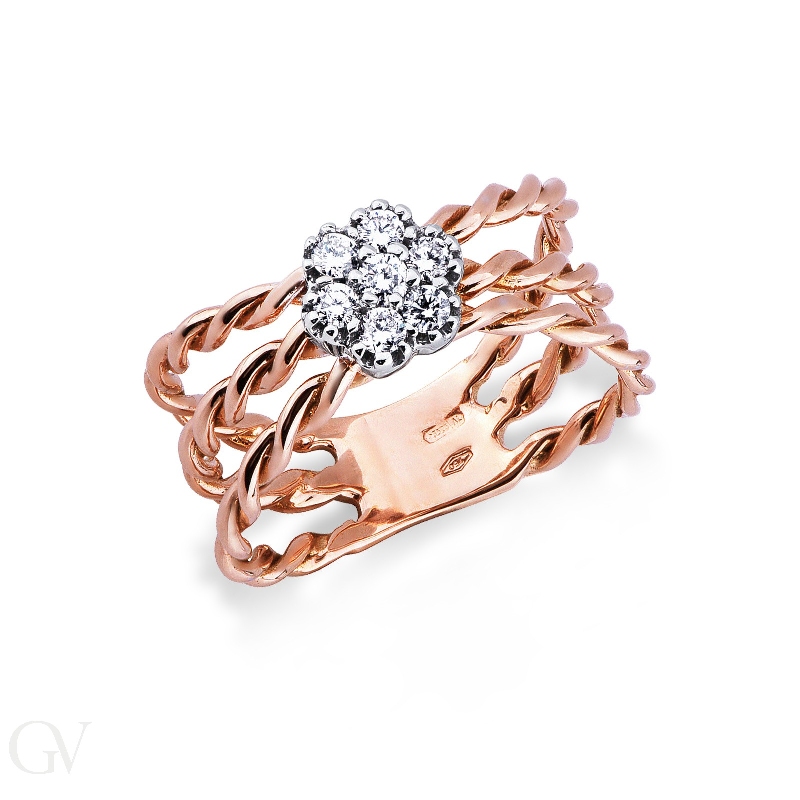 Band ring in white and rosé gold 18k with a diamond flower