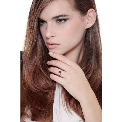 18k white gold with a central ruby and six diamonds on each side 