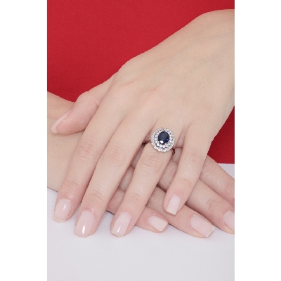 Halo ring white gold 18k with central heart cut blue sapphire and diamonds 