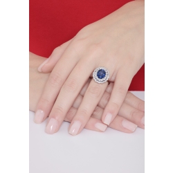 Halo ring with a central blue sapphire and diamonds white gold 18k 2