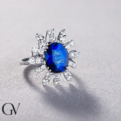 Halo ring white gold 18k with diamonds and blue sapphire