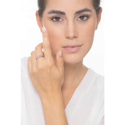 White gold 18k ring with a pink sapphire heart cut and two diamonds 