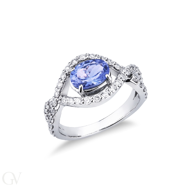 White gold 18k ring with an oval cut tanzanite of about 6x7mm and diamonds 