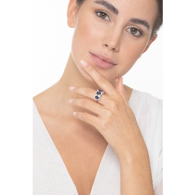 18k white gold halo ring with 3 Oval sapphires crowned by diamonds