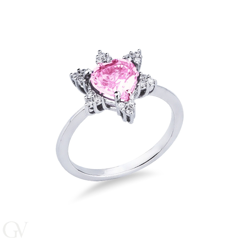 White gold 18k ring with a central pink sapphire heart cut and six diamonds' petals