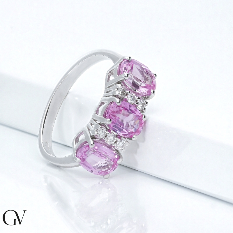 18k white gold with three pink sapphires and diamonds
