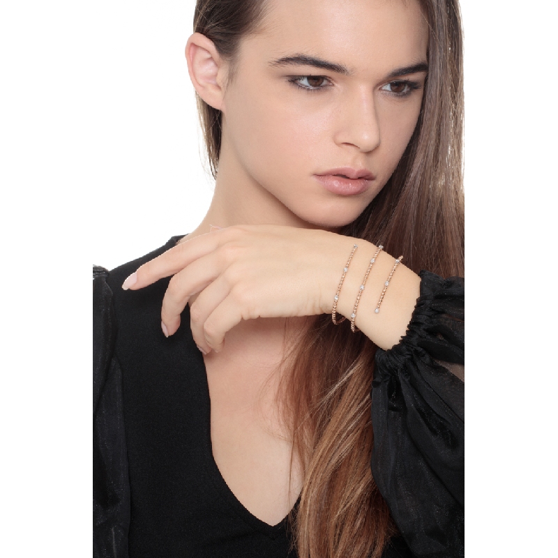 18k rose and white bracelet with spheres and diamonds