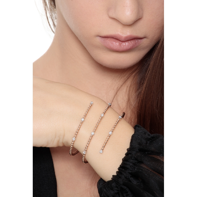 18k rose and white bracelet with spheres and diamonds