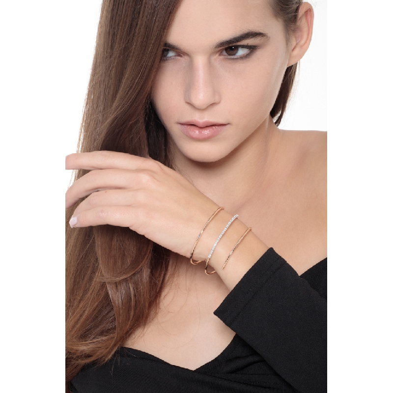 18k rose gold spiral bracelet with diamonds and emeralds