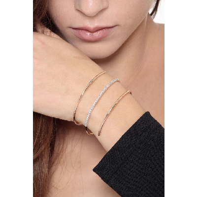 18k rose gold spiral bracelet with diamonds and emeralds