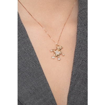 Cute bear pendant in 18k rose gold with diamonds
