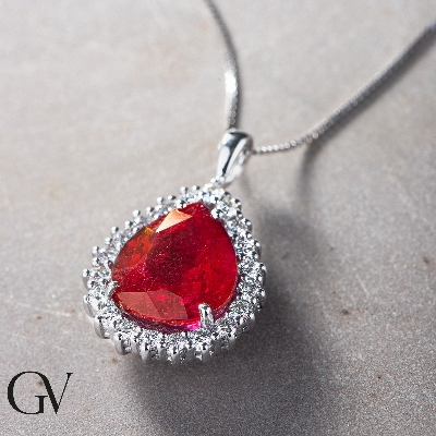 Necklace with pendant, pear cut ruby and round cut diamonds