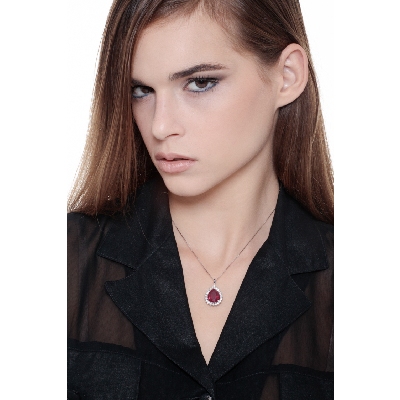 Necklace with pendant, pear cut ruby and round cut diamonds