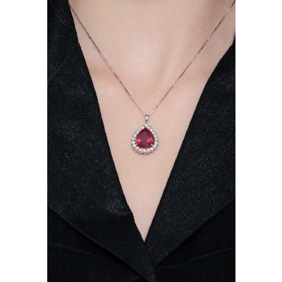 Necklace with pendant, pear cut ruby and round cut diamonds