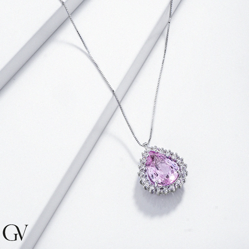 Fancy pear cut pink sapphire with diamonds