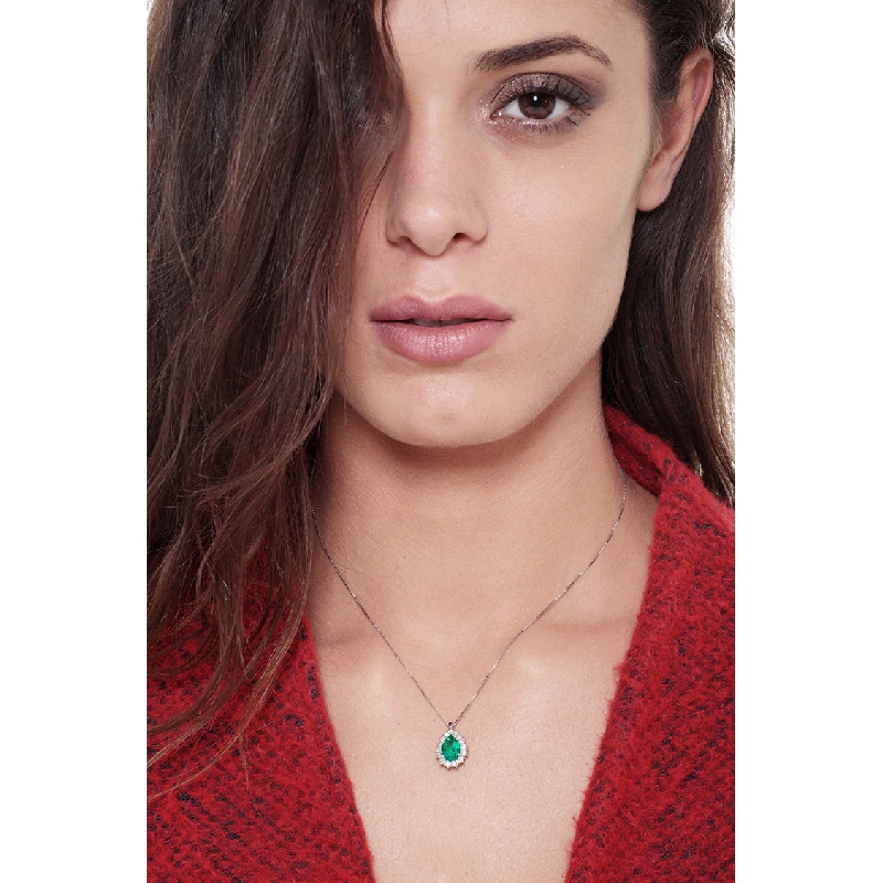 Necklace with pendant, pear cut emerald and diamonds