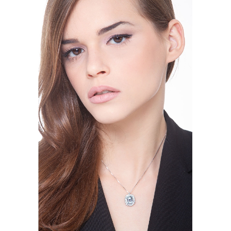Necklace with emerald cut aquamarine crowned by diamonds