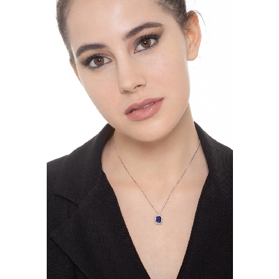 Necklace with pendant, emerald cut blue sapphire and diamonds