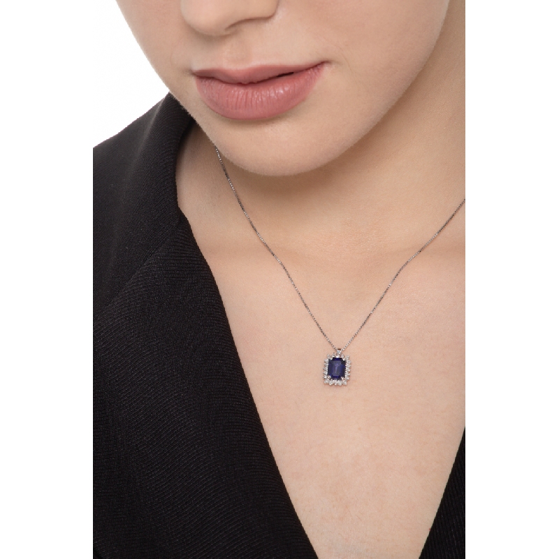 Necklace with pendant, emerald cut blue sapphire and diamonds