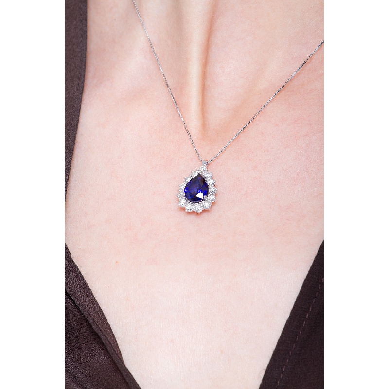 Necklace with pendant, central pear cut blue sapphire and diamonds