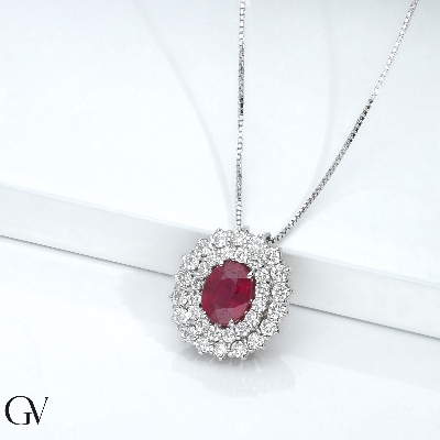 Double halo neacklace in white gold 18k with central ruby oval cut and diamonds 