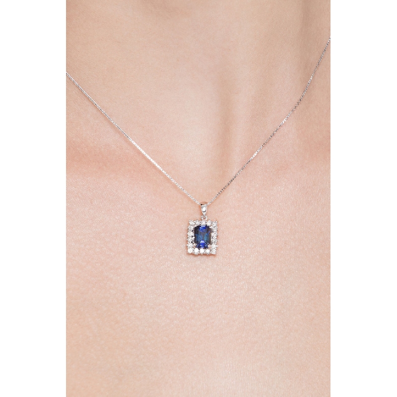 Necklace with pendant, central emerald cut blue sapphire and diamonds