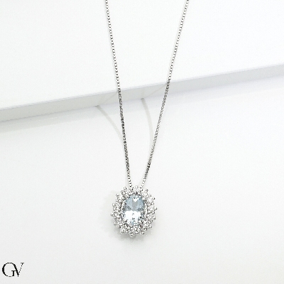 White gold 18k halo pendant with diamonds and oval cut aquamarine