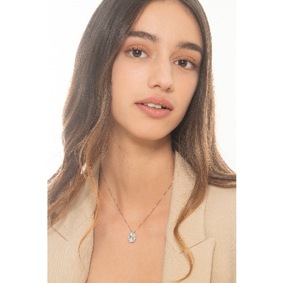 White gold 18k halo pendant with diamonds and oval cut aquamarine