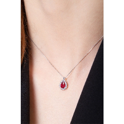 Necklace with diamonds and pear cut ruby pendant