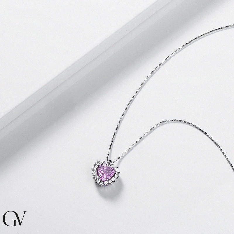 Halo necklace with pink sapphire and diamonds