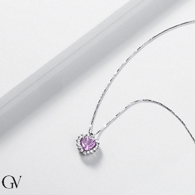 Halo necklace with pink sapphire and diamonds