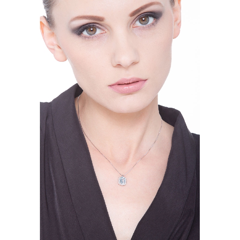 Necklace with diamonds and emerald cut aquamarine pendant