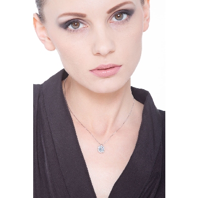 Necklace with diamonds and emerald cut aquamarine pendant