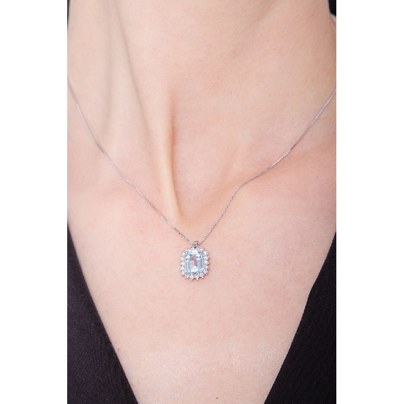 Necklace with diamonds and emerald cut aquamarine pendant