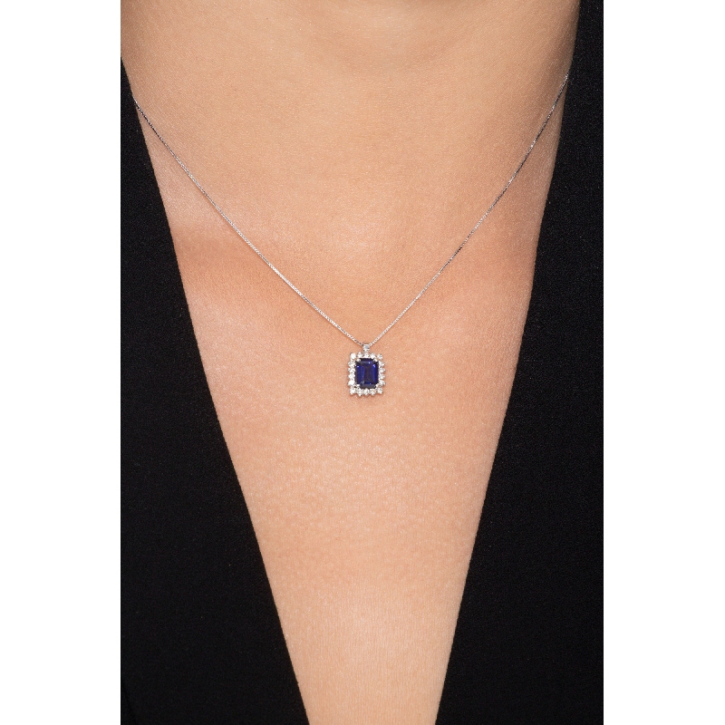 Necklace with pendant, emerald cut blue sapphire and diamonds